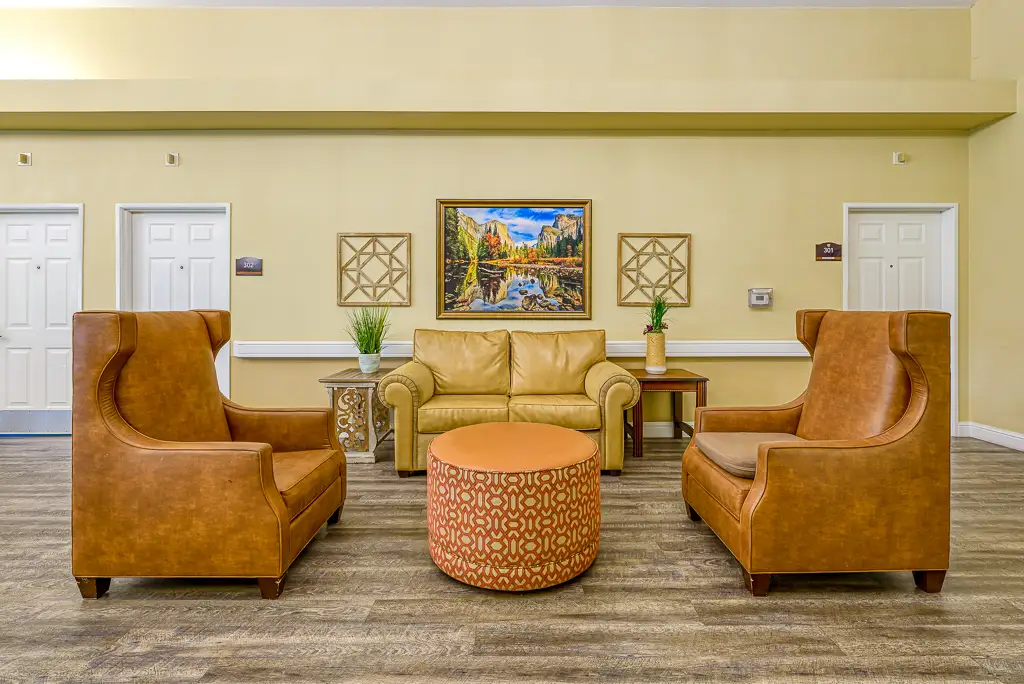 Common Area with Chairs and Loveseat Common Area with Chairs and Loveseat